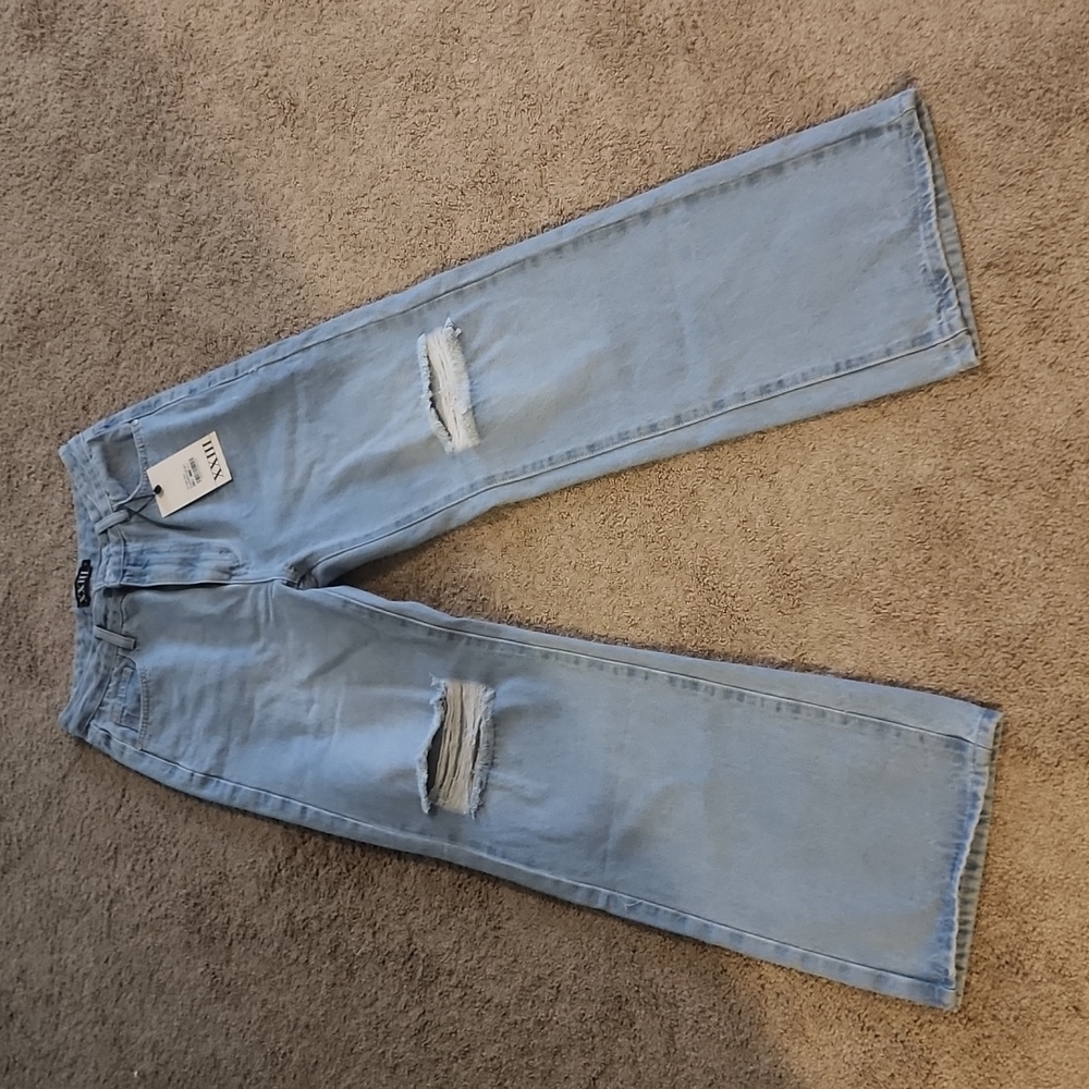 Ripped knee jeans